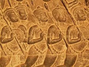 Khmer: Cambodia - Bas-reliefs of warriors at the west