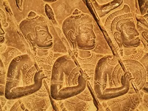 Khmer: Cambodia - Bas-reliefs of warriors at the west