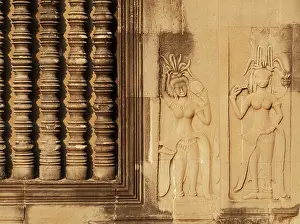 Khmer: Cambodia - Blind window with colonettes and Devatas