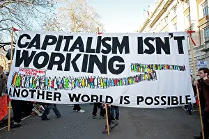 Protest: Campaigners with Capitalism isn't working' banner