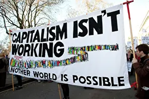 Protest: Campaigners with Capitalism isn't working banner