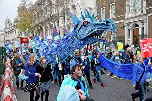 Communities: Campaigners with Welsh dragon on The Wave Climate Change