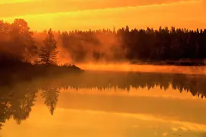 Grandmaison: Canada, Manitoba. Fog at sunrise over Whiteshell