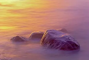 Foam: Canada, Manitoba. Sunrise on Lake Winnipeg
