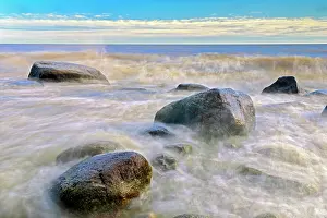 Crashing: Canada, Manitoba. Waves crashing on shoreline