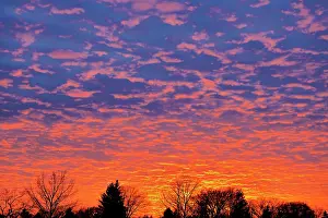 Winnipeg: Canada, Manitoba, Winnipeg. Clouds at sunset