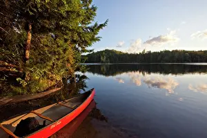 Hyde: Canoe on the shore next to Zack Woods Pond