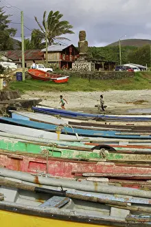 Drawn: Canoes drawn up on beach, and children. Hanga Roa