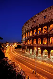 Gladiator: Car light-trails in front of the Roman Coliseum