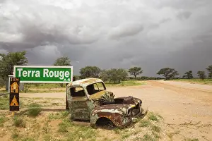 Trucks: Car wreck at the entrance gate of the Terra Rouge