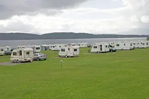 Oban: Caravans on beach front Caravan Club Site, North
