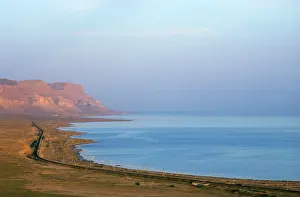 Krasnovodsk: Caspian sea shore - railway to Krasnovodsk town - sunset