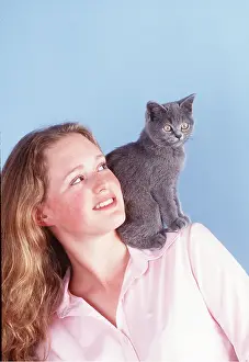 Girls: CAT - kitten sitting on girls shoulder