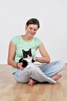 Owners: Cat - sitting on owners lap being stroked