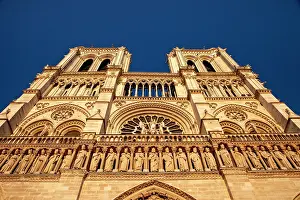 Parisian: Cathedral Notre Dame bathed in setting sunlight