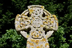 Churchyard: Celtic Cross - covered in lichens
