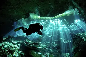 Cenote: Cenote Silhouette of diver - DOS - OJOS