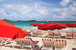 Chairs: Chairs and red umbrellas along Orient Beach
