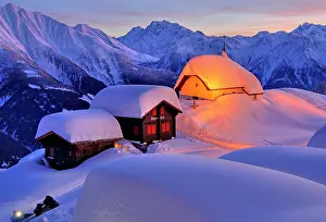Maria: Chapel Maria in the snow with deep snow in the village