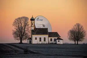 Opposite: Chapel St. Johann with parabolic antenna at blue