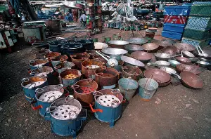 Selling: Charcoal cooking stoves in downtown market