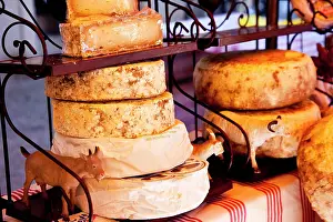 Sale: Cheeses for sale at the market in Saint