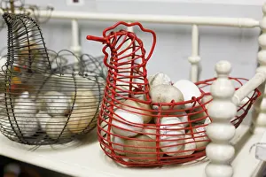 Metal: Chicken-shaped metal baskets holding rocks