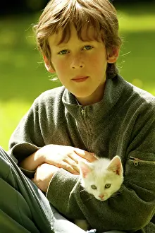 Choosing: Child & Cat - Boy with Kitten in arms