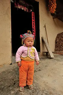 Qinling: Child - in front of farmer's house
