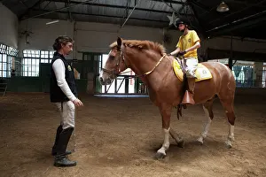 Speaking: Child listening to the instructions of balance on a horse
