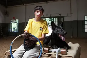 Exercise: Child suffering from paralysis and dog after exercise