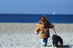 Frederic Rolland: CHILD - walking on beach