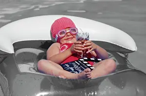 Mono: Child - water baby floating on lilo
