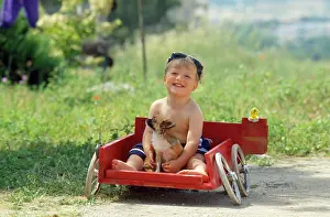 Cart: Children - boy in cart with dog