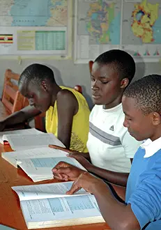 Books: Children at Equatorial College School - reading books