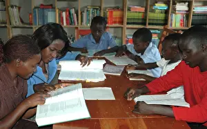 Books: Children at Equatorial College School - reading books