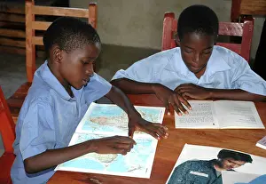 Books: Children at Equatorial College School - reading books