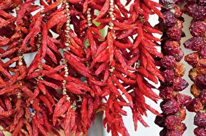 Chillies: Chilli pepper, Capsicum annuum, strings of chilies hung up t