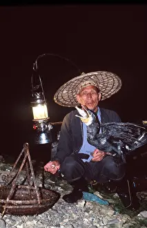 Fisherman: CHINA - Fisherman fishing with cormorants
