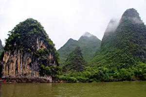 Guilin: China, Guangxi, Guilin, Li River. Misty