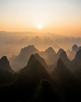 Guilin: Chinese karst mountains near Yangshuo at sunrise