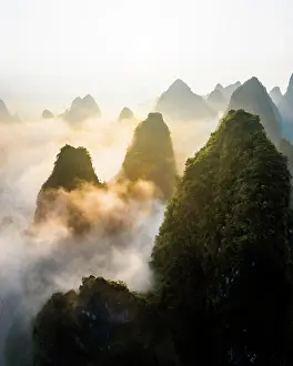 Mystic: Chinese karst mountains near Yangshuo at sunrise