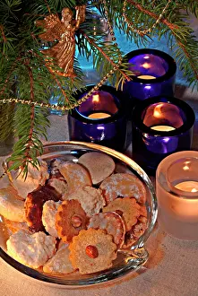 Burning: Christmas biscuits cookies with burning candles