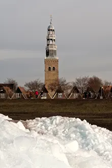 Drifting: The church of Hindeloopen with drifting ice in foreground