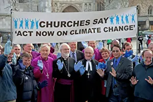 Communities: Church leaders with banner outside Houses of Parliament