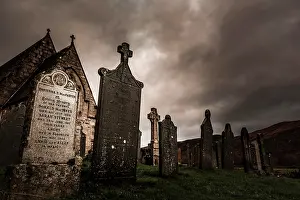 Glen: Church St. John with cemetery under dramatic sky