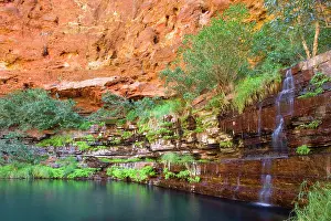Heavily: Circular Pool - water cascades down a steep, heavily