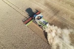 Vehicle: Claas combine harvester, grain harvest, harvesting