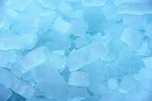 Dikes: Close up of ice pushing up against dikes