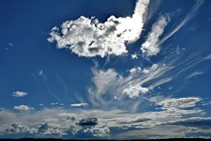 Lightness: Cloud formations against a blue sky, France